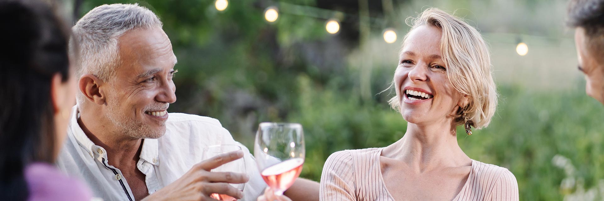 Image shows a man enjoying dinner